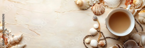 Seashells coffee and pearls coastal still life arrangement