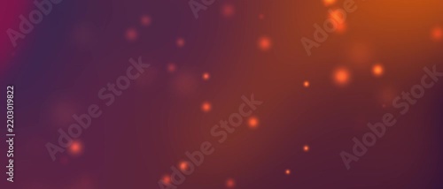 Abstract glowing particles float in warm orange purple gradient background bokeh effect