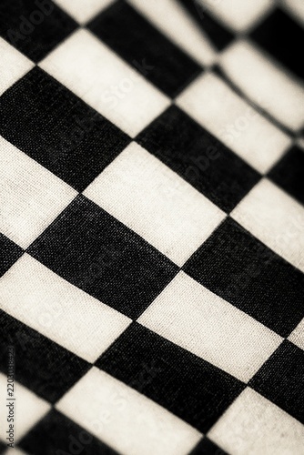 checkered flag in vertical orientation; finish line banner