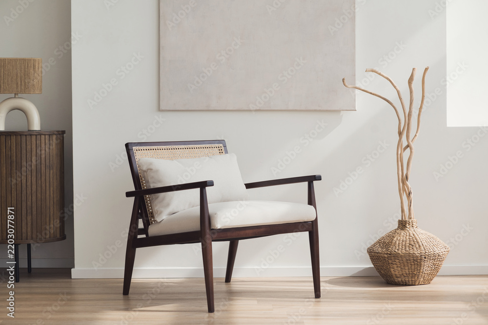 Fototapeta premium Modern scandinavian style interior with chair and trendy vase, Home staging and minimalism concept, Soft natural light, calm cozy atmosphere.