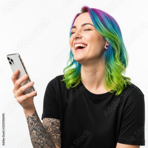 Young woman with colorful hair smiling at smartphone