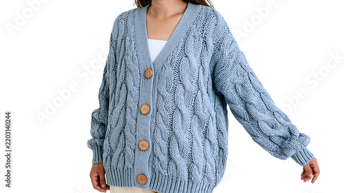 Cuadro en lienzo Isolated stylish woman wearing a cozy light blue chunky cable knit cardigan with