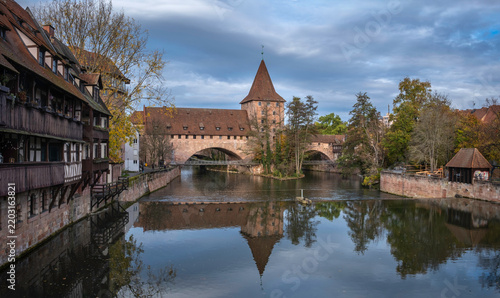 Panoramic view of the traditional old town architecture  in Nuremberg with river Pegnitz and Kettensteg, Bavaria, Germany.