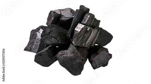 Isolated pile of natural charcoal or coal chunks, essential fuel for heating and industry