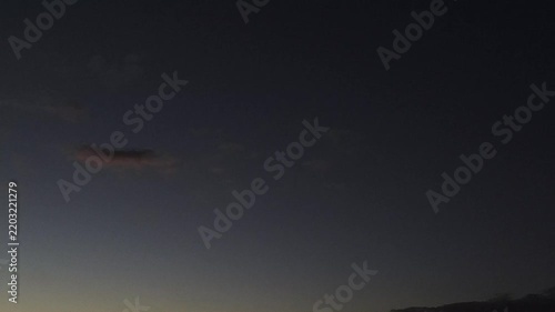 Orangeish clouds in the sky at dusk