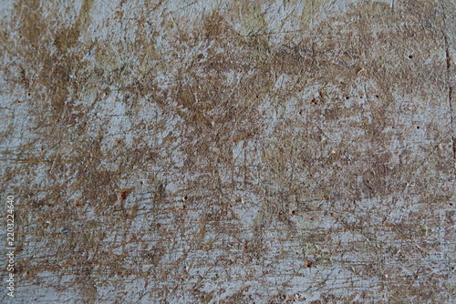 Abstract grunge texture of scratched brown and white workbench surface