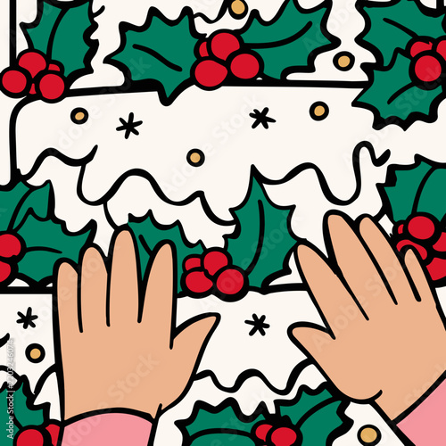 Hands decorating a festive cake with holly leaves and berries  