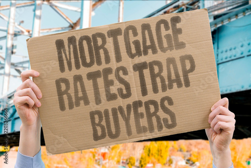 Obraz na płótnie "Mortgage Rates Trap Buyers" Late homebuyers face steep monthly payments after missing earlier windows