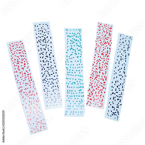 Five vertical paper strips with dotted patterns on white background isolated on a transparent background
