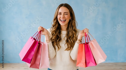 Happy Young Woman Shopper Holding Colorful Shopping Bags and Winking against Blue Background