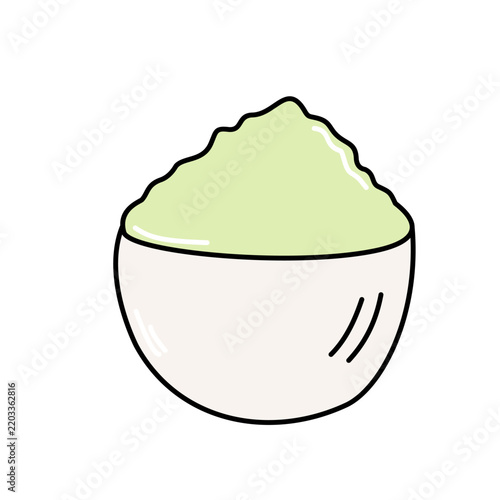 A bowl of light green powder, possibly matcha, with a smooth, soft texture
