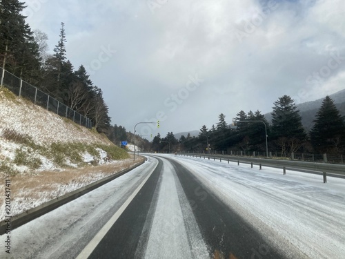 Snow-covered road at Nissho Pass in Hokkaido, Japan