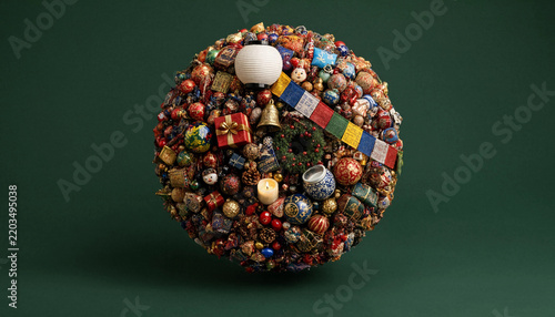 Global holiday celebration concept with multicultural ornaments and festive decorations arranged in a sphere on green background