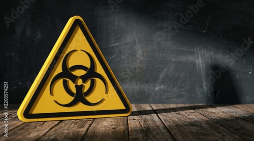 Yellow biohazard warning sign, a critical symbol for biological risk and danger. Essential safety icon for hazardous materials, public health, and environmental protection.