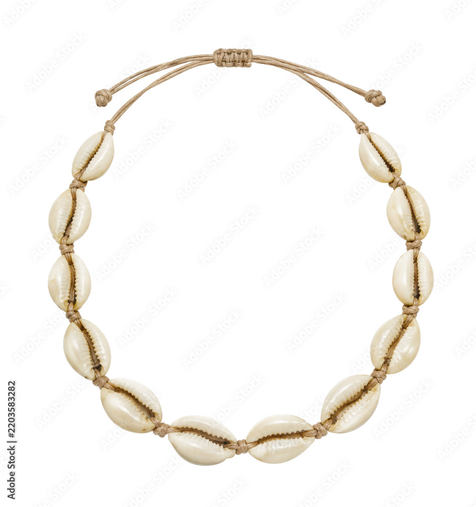 Obraz premium Beautiful handmade cowrie shell necklace with natural beige cord, featuring an adjustable knot, isolated on a clean white background