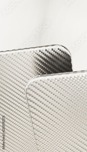 Close-up of carbon fiber weave pattern texture and surface