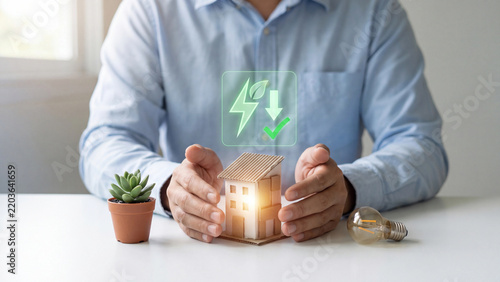 Home energy saving and green electricity reduction concept, man protecting house model with eco energy symbol, lightbulb and plant for sustainable home and lower power consumption
