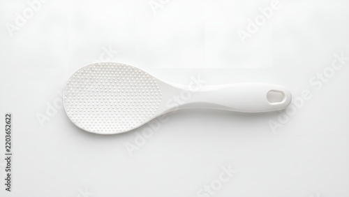 White plastic rice paddle isolated on white background.