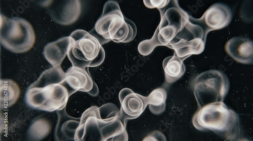 abstract close-up of fluid shapes on dark background