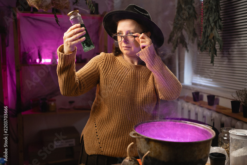 Cuadro en lienzo realistic witch brewing a potion in a cauldron