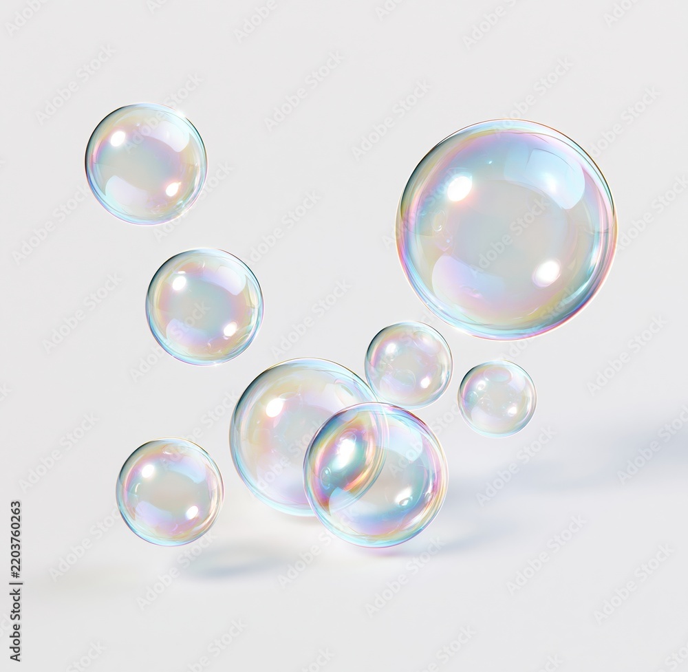 Obraz premium Colorful soap bubbles floating against white background