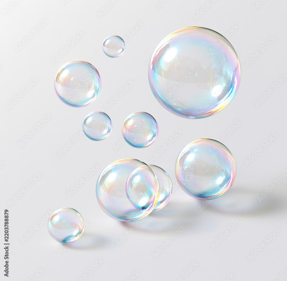 Obraz premium Colorful soap bubbles floating against white background