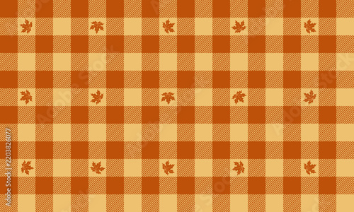 Autumn checkered orange and yellow tartan plaid pattern with maple leaves. Vector illustration