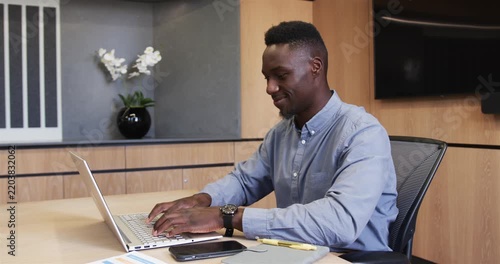 Lifestyle videos indoor of people doing activities at office, typing on laptop and smiling, business