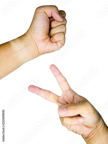 Two hands playing rock paper scissors game.