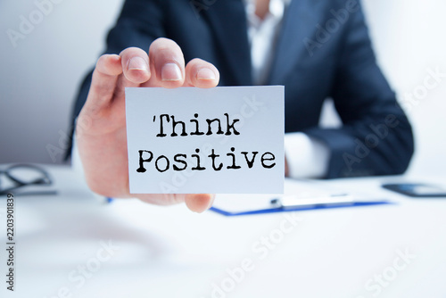 Think Positive text on paper