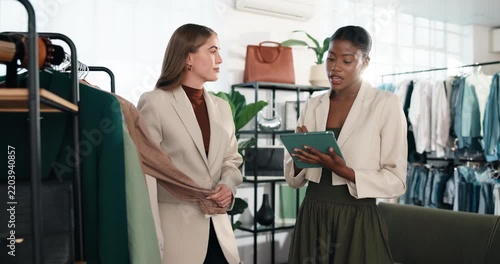 Fashion, client and women in clothing store with tablet, retail recommendation and sales discount. Tech, customer and happy person shopping in boutique at rack for style choice, help or merchandising
