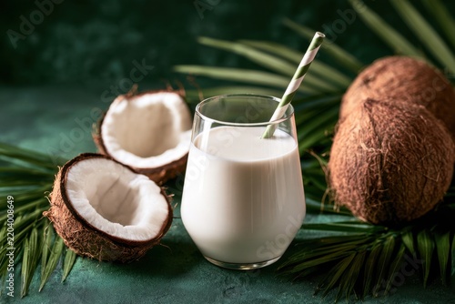 Vegan Coconut Milk Glass Straw Fresh Coconuts Dark Green Background Close Up