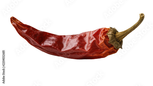 Dried red chili pepper with wrinkled skin, isolated on transparent background