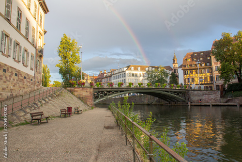Rainbow Over Historic Strasbourg Old Town with Canal and Traditional Alsatian Architecture, France
