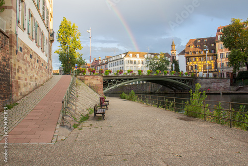 Rainbow Over Historic Strasbourg Old Town with Canal and Traditional Alsatian Architecture, France