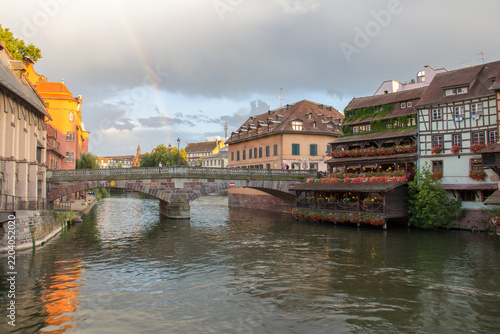 Rainbow Over Historic Strasbourg Old Town with Canal and Traditional Alsatian Architecture, France