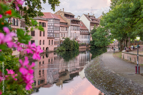 Strasbourg Petite France historic district with half-timbered houses and canal at golden hour, Alsace France