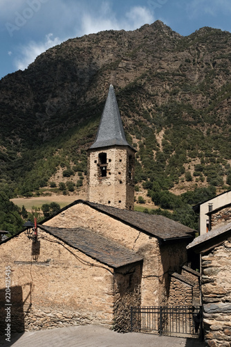 View of Santa Maria church in the historic village of Escaló on sunny summer day. Lleida, Catalonia, Spain.