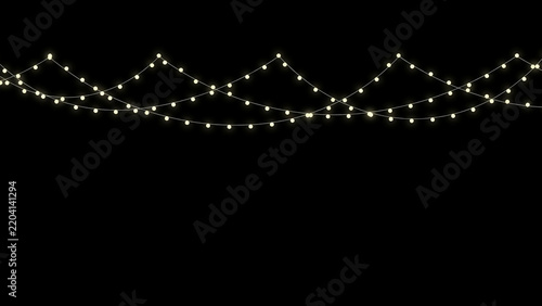 String of decorative string lights hanging against black background for festive or event decoration