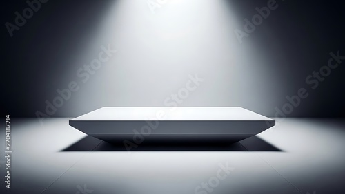 Minimalist white display podium with dramatic top lighting