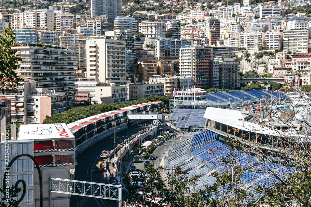 Obraz premium Monaco, Monaco - April 04, 2026: Elevated view of temporary grandstands and circuit infrastructure at Port Hercule ahead of the Formula 1 Monaco Grand Prix.