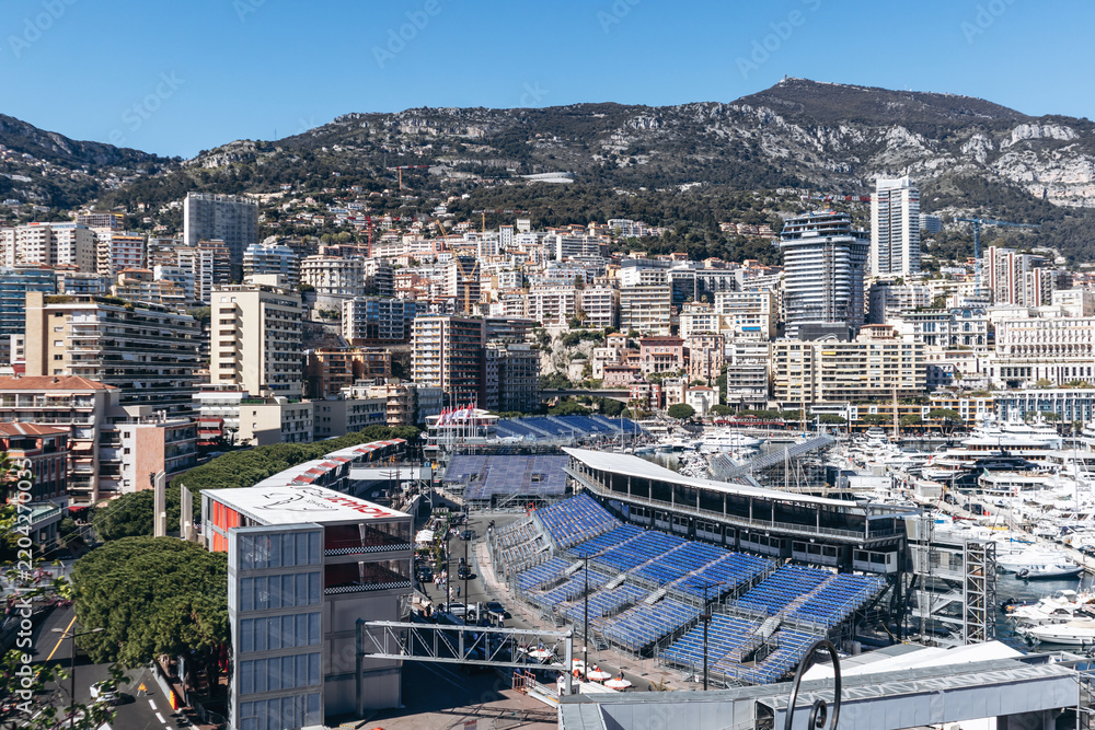 Obraz premium Monaco, Monaco - April 04, 2026: Elevated view of temporary grandstands and circuit infrastructure at Port Hercule ahead of the Formula 1 Monaco Grand Prix.