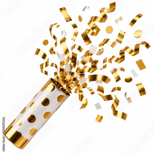 Confetti Bursts From a Party Popper for Celebration at an Event