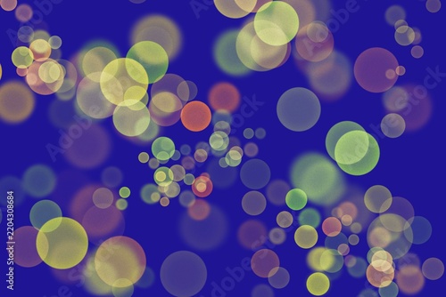 Abstract blue background with glowing circular bokeh and soft bubbles pattern