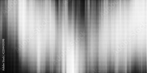 Abstract halftone background with black and white dotted pattern, grunge texture design element for graphic projects