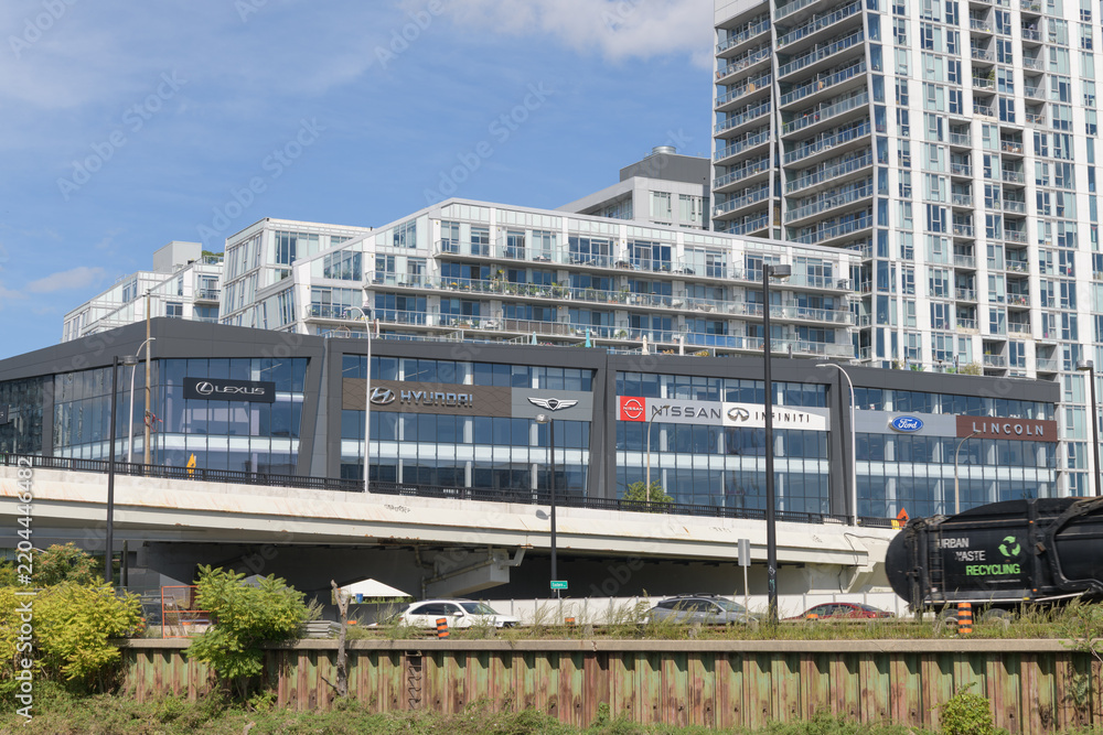 Obraz premium exterior building facade and signs at Downtown AutoGroup - Autoplex located at 77 East Don Roadway, Toronto