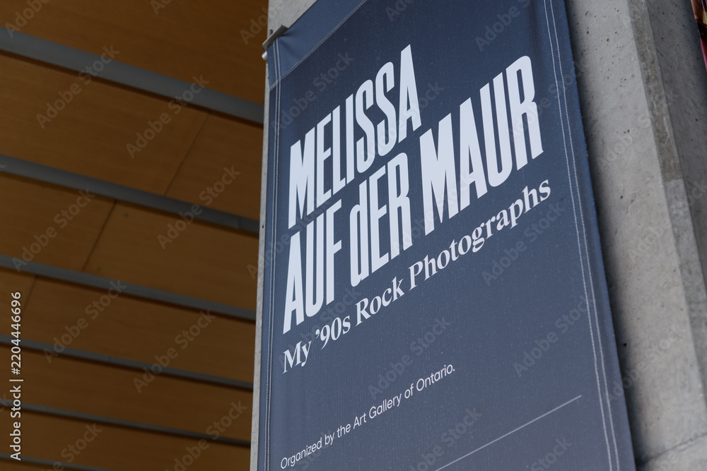 Obraz premium banner promoting the exhibition, Melissa Auf der Maur: My ‘90s Rock Photographs, outside the Art Gallery of Ontario, 317 Dundas St W, Toronto