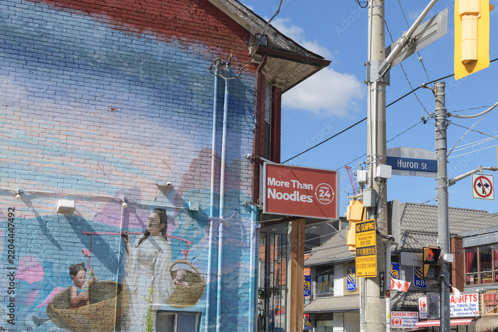 Obraz premium mural and projecting sign at More Than Noodles, a Chinese restaurant, located at 449 Dundas St W, Toronto