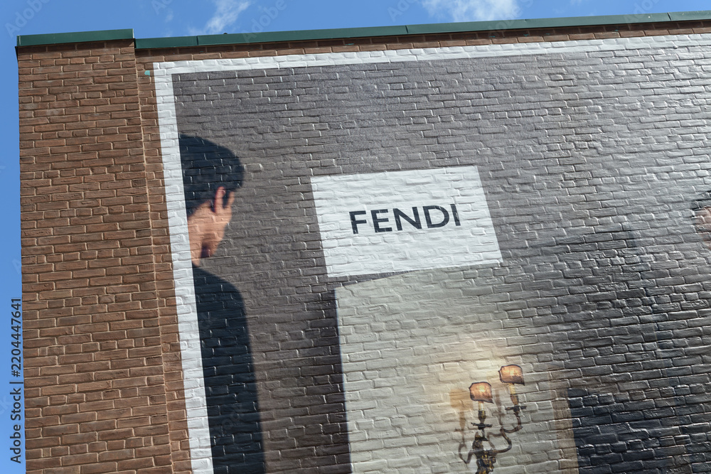 Fototapeta premium detail of large-scale FENDI fashion advertising, using a trompe l'oeil or graphic 