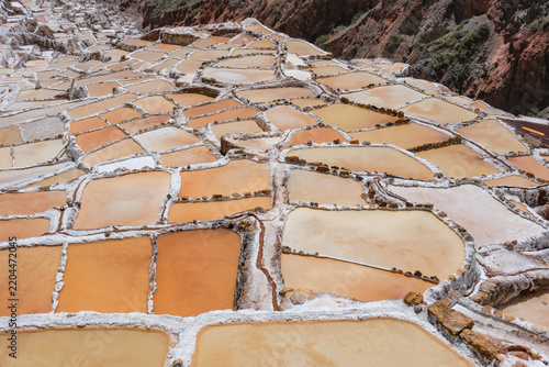 Maras, Peru - August 27, 2026: The Salt Mines of Maras is one of the largest salt extraction centers of prehispanic origin in Cusco Region, Urubamba, Peru.